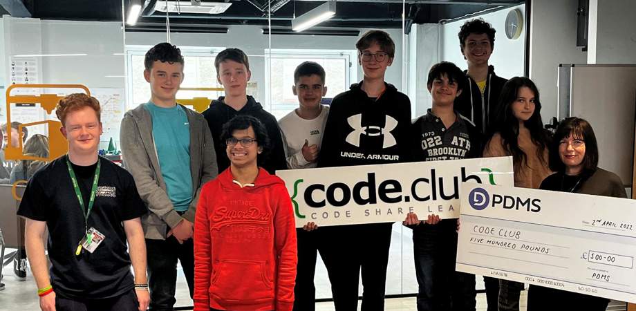 IOM Code Club cheque presentation