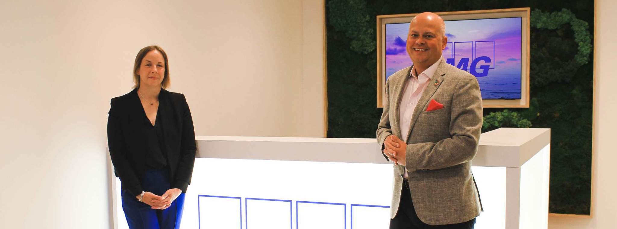 A photo of Chief Commercial Officer, Cat Watt (PDMS) and Simon Nicholas, Head of Clients & Markets (KPMG)