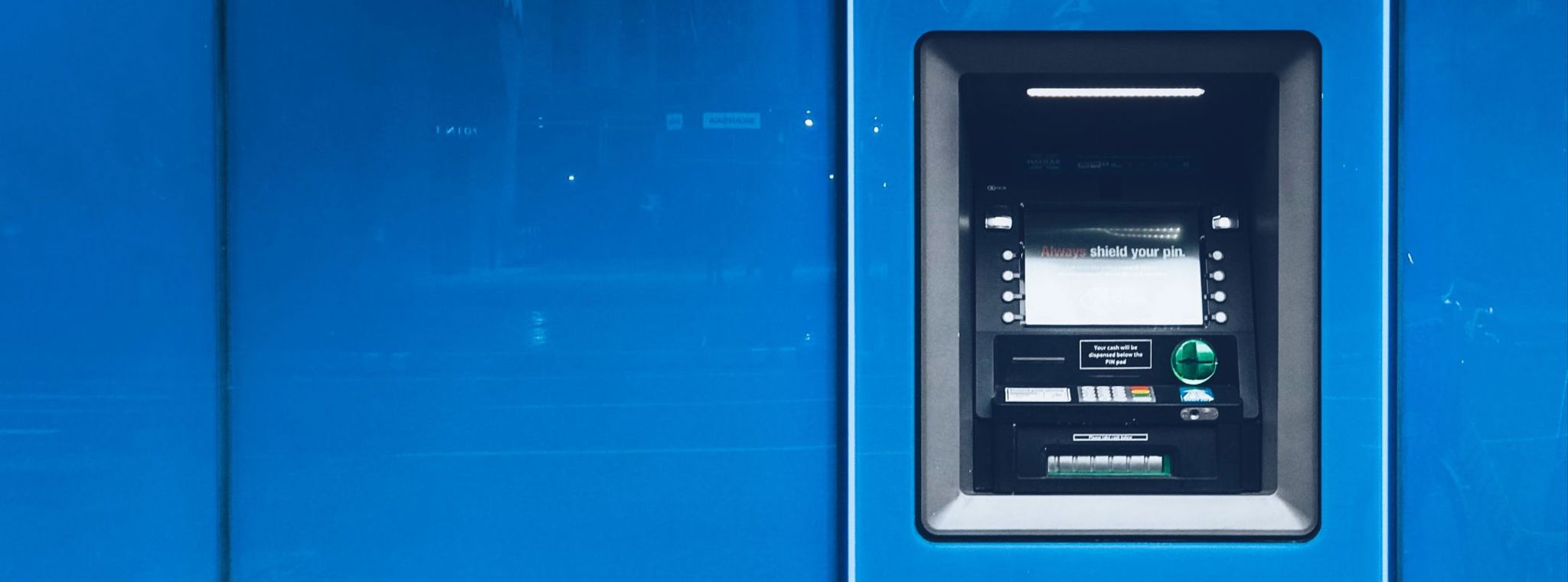 A picture of a blue cash machine