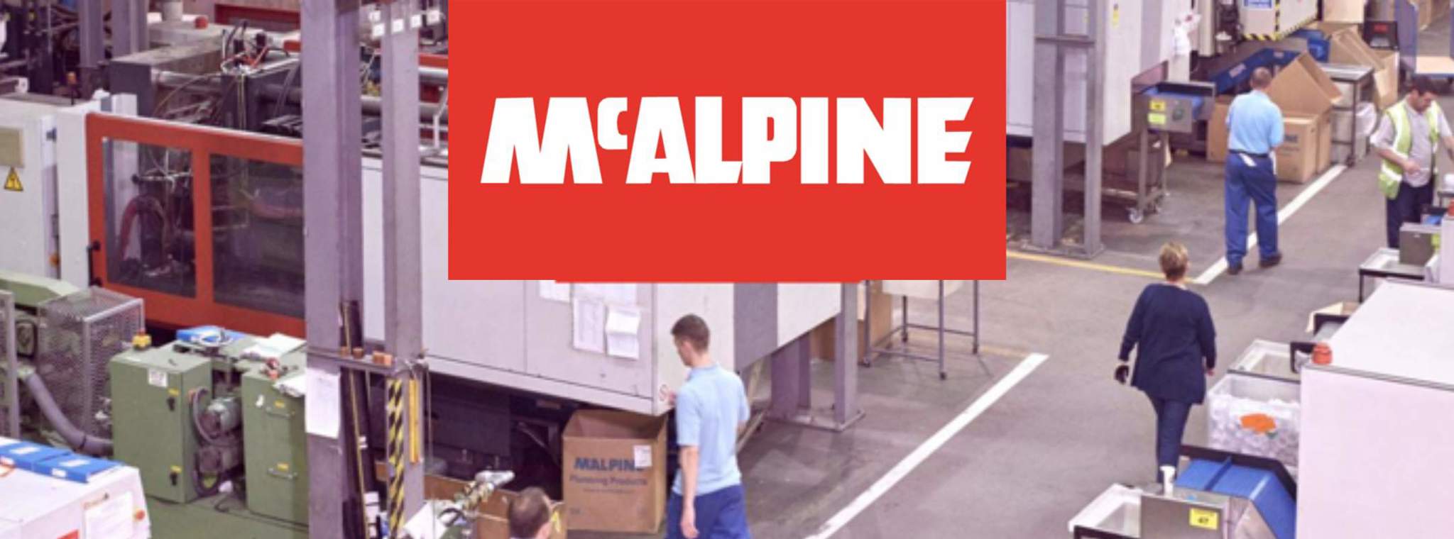 McAlpine plumbing logo and photo of factory shop floor