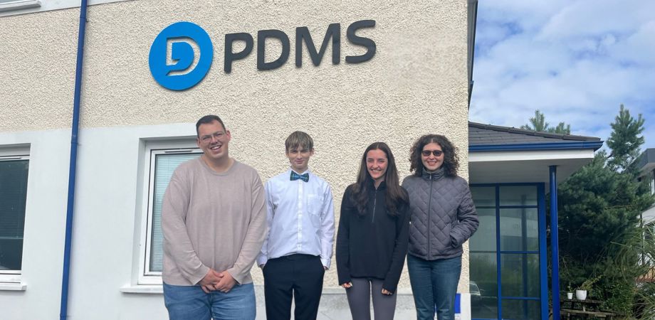 Four people stood outside PDMS Global House - L:R Nick Collins, Dagan Harris, Georgia Vernon, Alexandra Koyfman