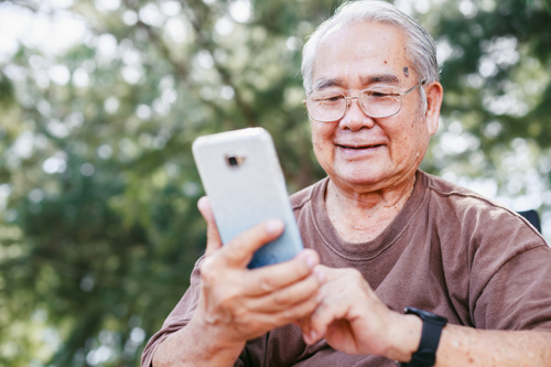 Elderly man on smartphone